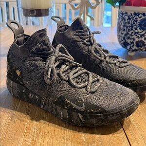 Nike Black Sneakers with White Sole Pattern